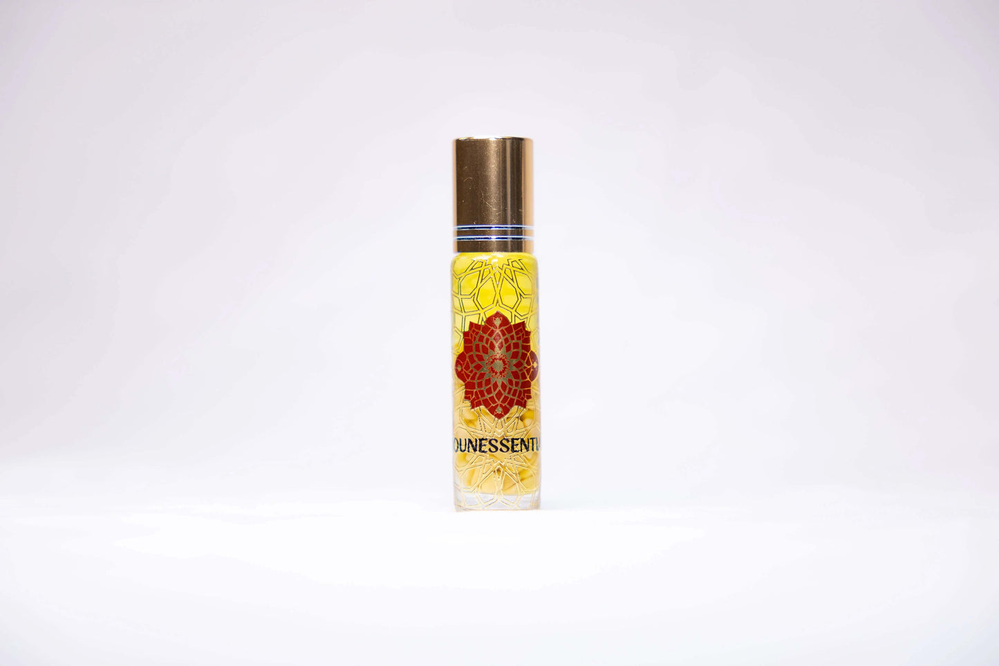 Frankincense and Yellow Jade Infusion Roll-On perfume bottle with floral design