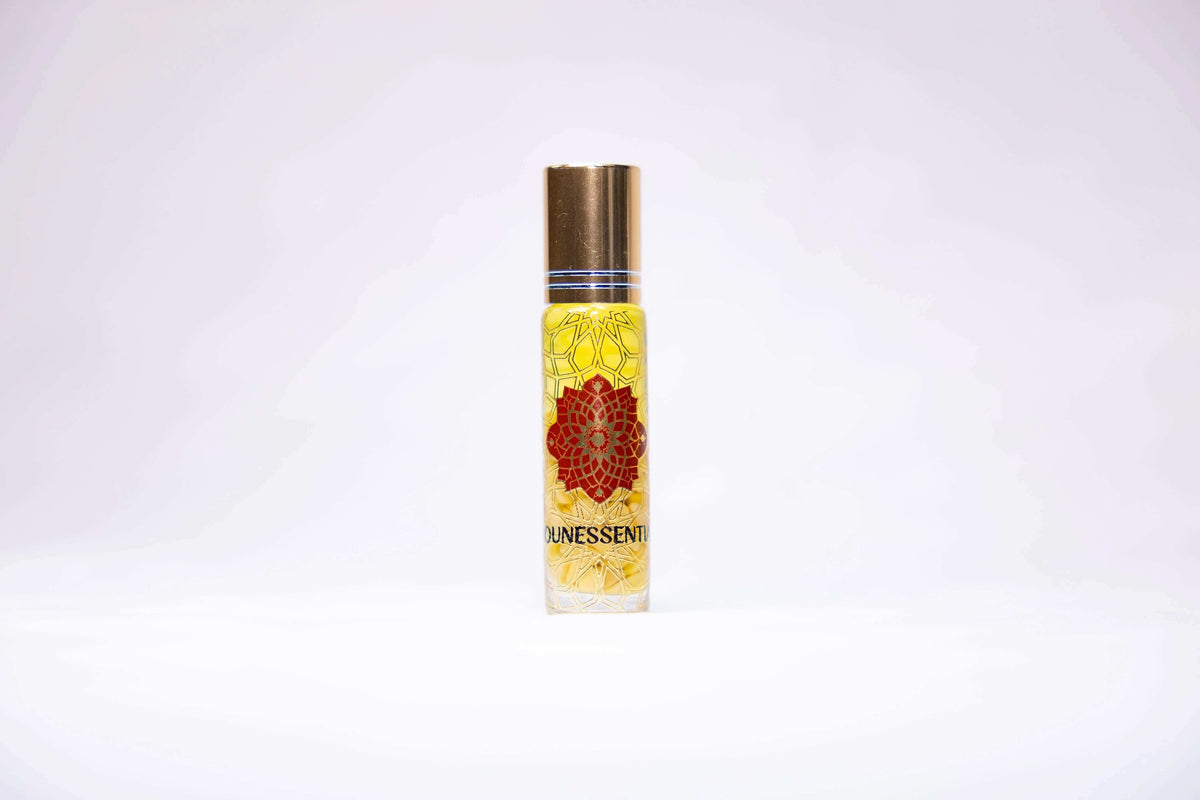 Frankincense and Yellow Jade Infusion Roll-On perfume bottle with floral design