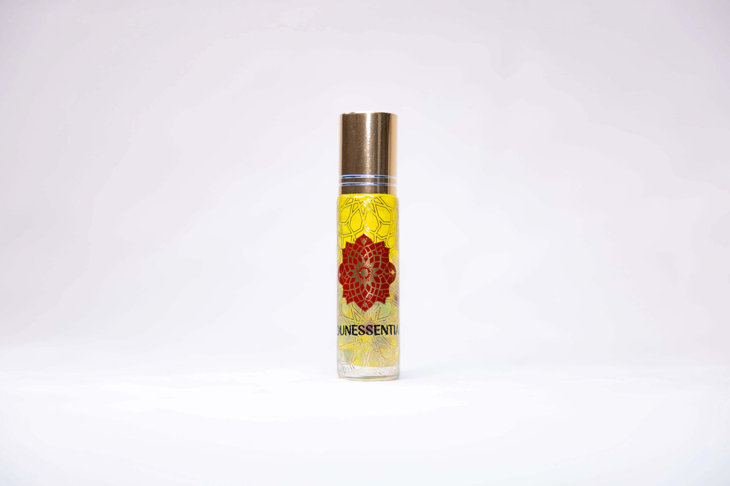Jasmine and Fluorite Infusion Roll-On in sleek glass bottle with gold cap