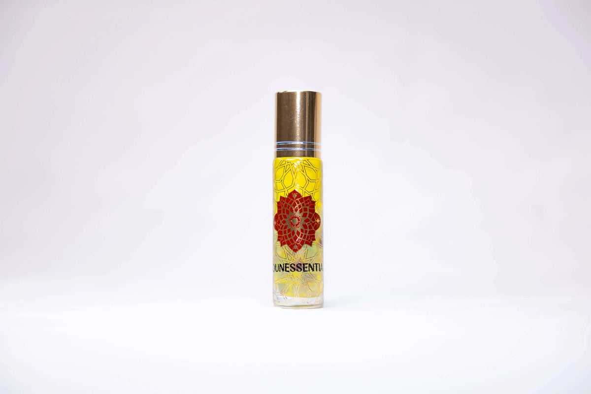 Jasmine and Fluorite Infusion Roll-On in sleek glass bottle with gold cap