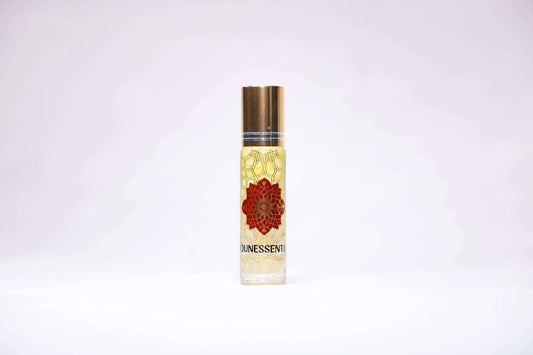 Citrine-infused lemon roll-on in clear glass bottle with gold cap and red floral design