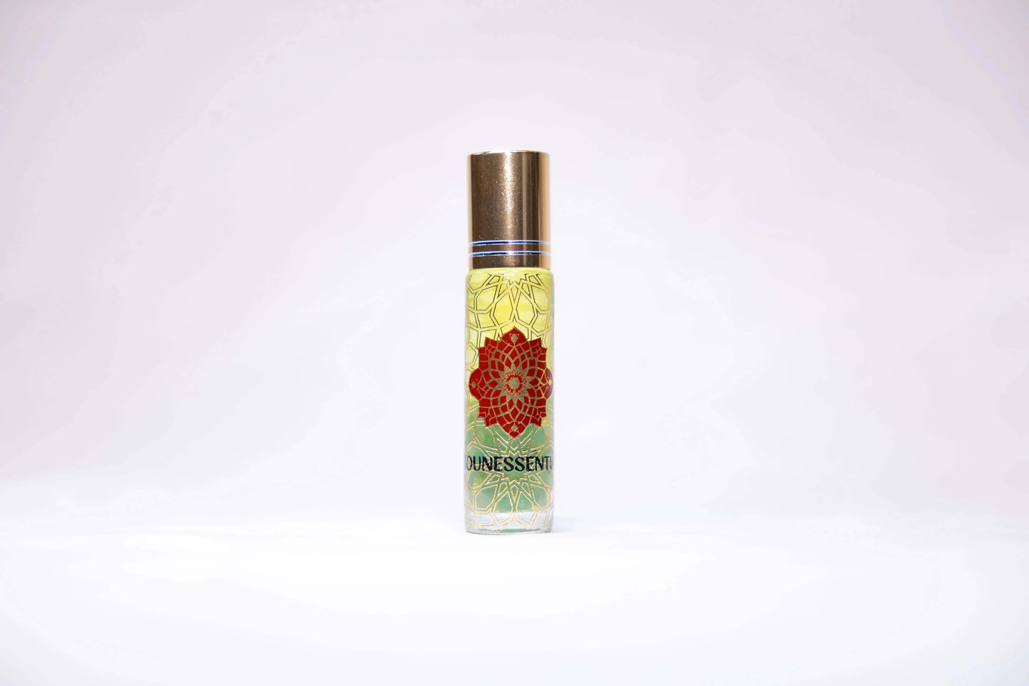 Clear glass roll-on perfume bottle with gold cap, Peridot-infused Eucalyptus mandala design