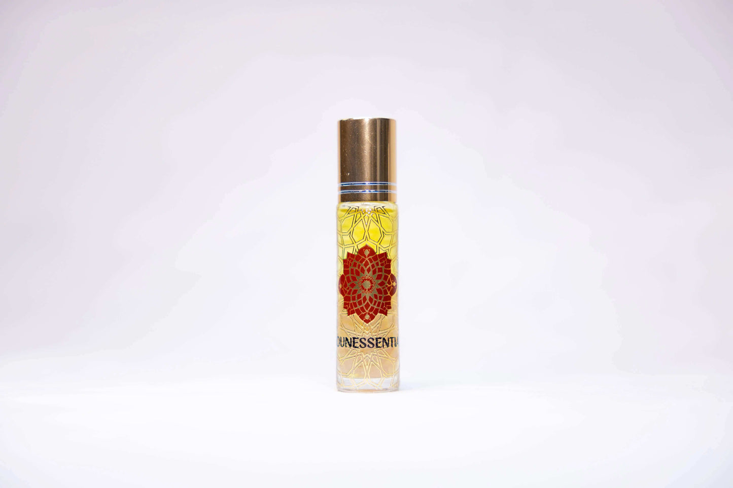 Moroccan Wild Rose and Rose Quartz Infusion Roll-On bottle with floral design