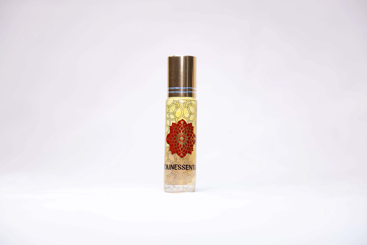 Strawberry Seed and Quartz Infusion Roll-On perfume bottle