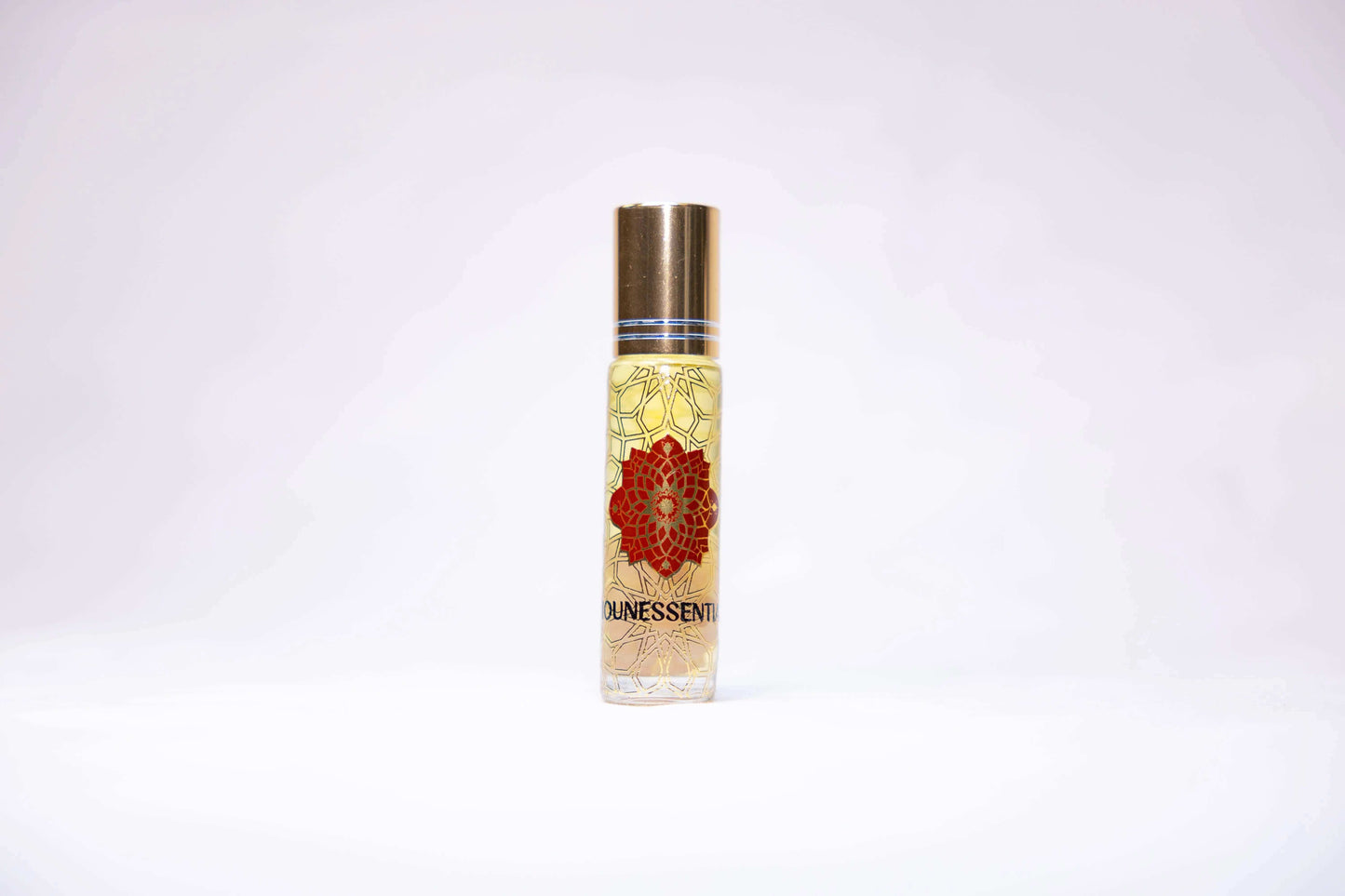 Strawberry Seed and Quartz Infusion Roll-On perfume bottle