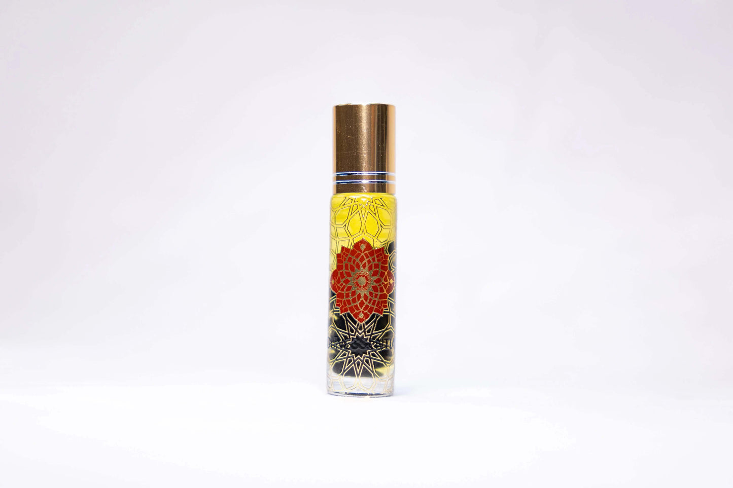 Vanilla and Obsidian Infusion Roll-On perfume bottle with mandala design