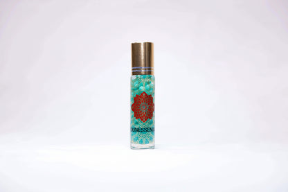 Clear glass roll-on perfume bottle with gold cap, Helichrysum and turquoise infusion body roll on