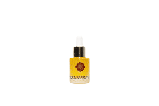 Pure Nounessentia strawberry seed essential oil in amber bottle